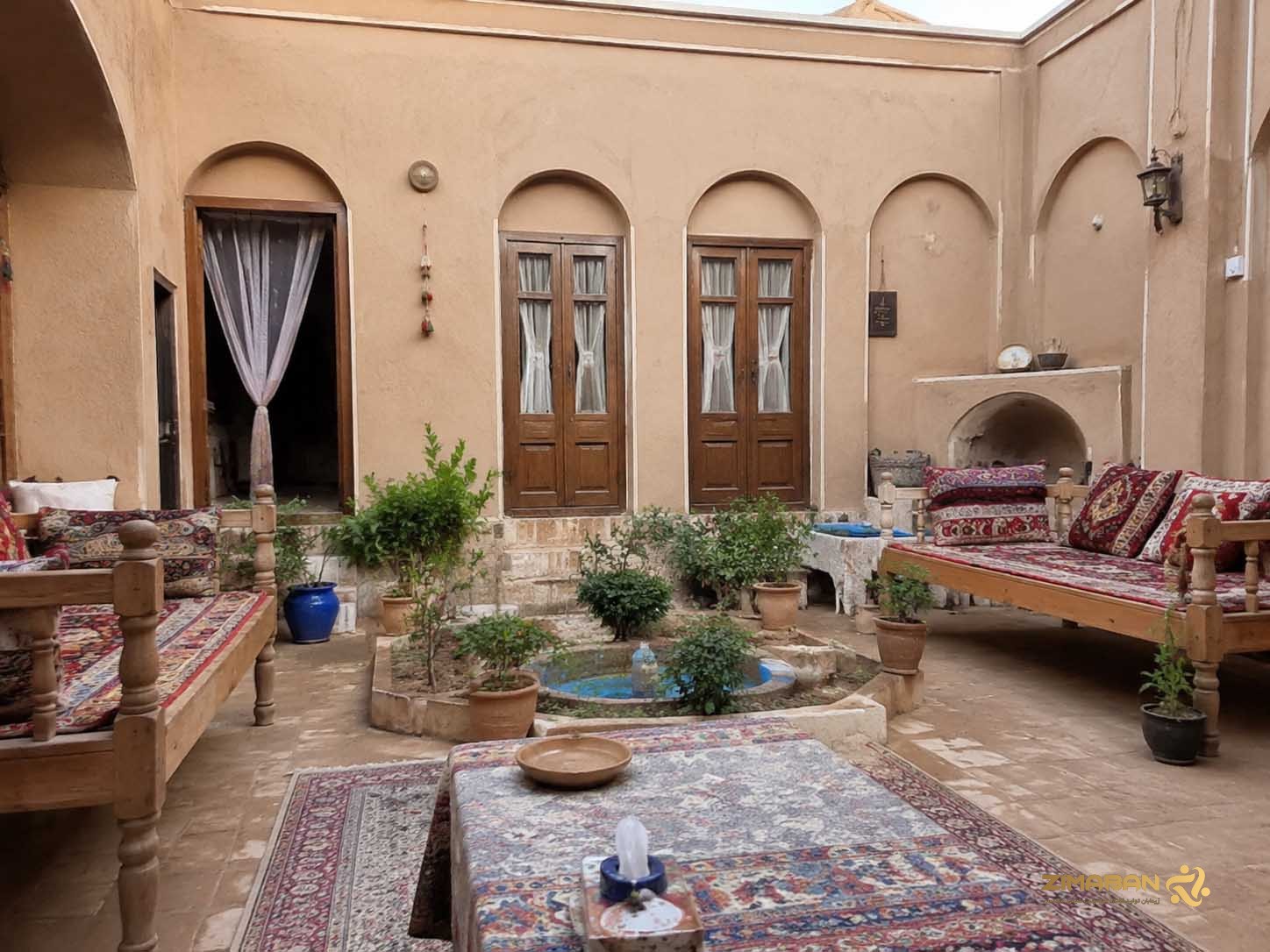 اجرای کاهگل سنتی آماده زیمابان در نمای ویلا
