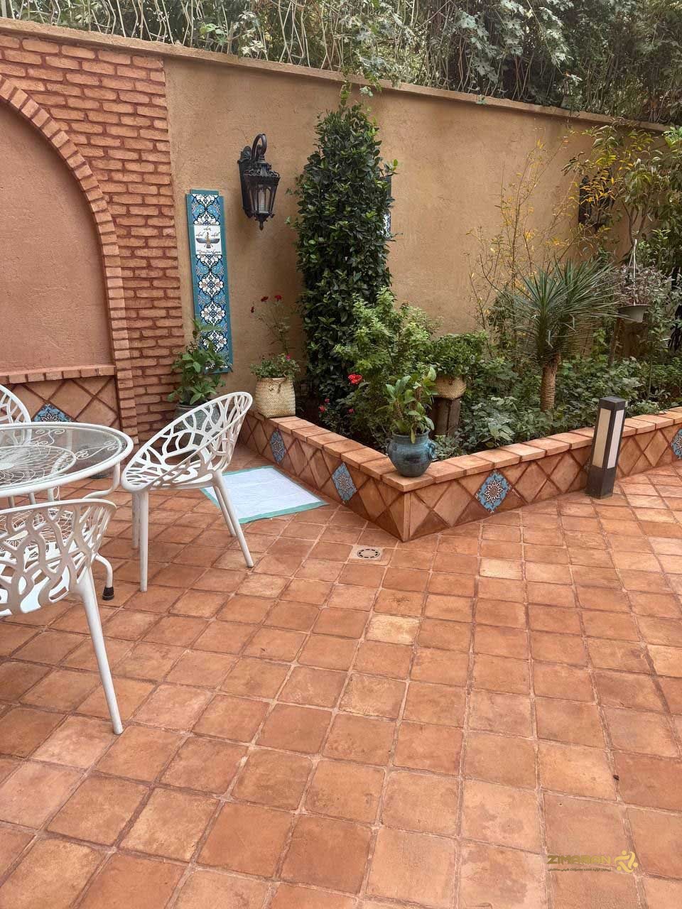 اجرای کاهگل سنتی زیمابان روی نمای ساختمان در پروژه واقعی